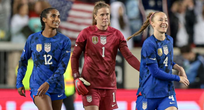 United States defender Naomi Girma, goalkeeper Alyssa Naeher and defender Becky Sauerbrunn celebrate after defeating Germany at Red Bull Arena.